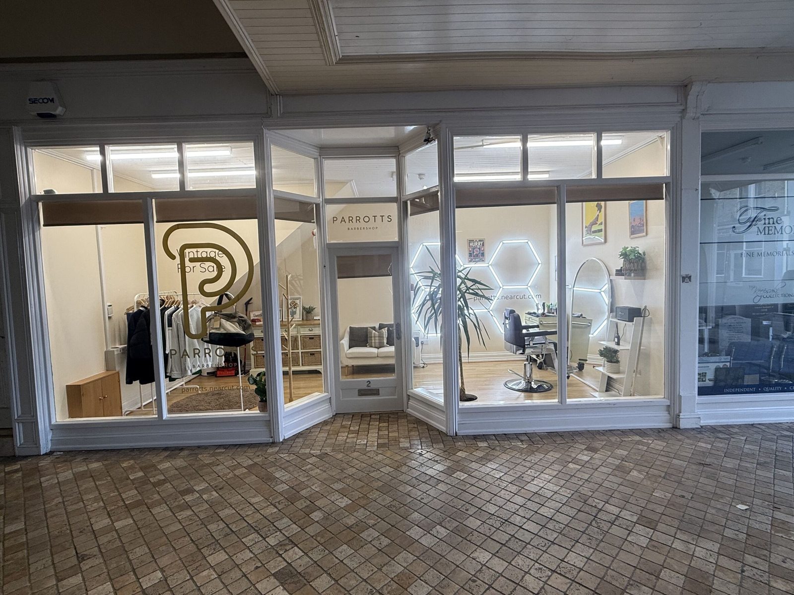 The PARROTTS shopfront in the Queens Walk arcade